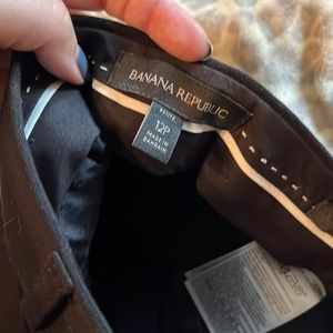 2 pairs of pants-1 black, 1 orange